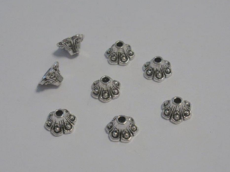 Kralenkapjes platinum 9MM 8 ST 12253-5304